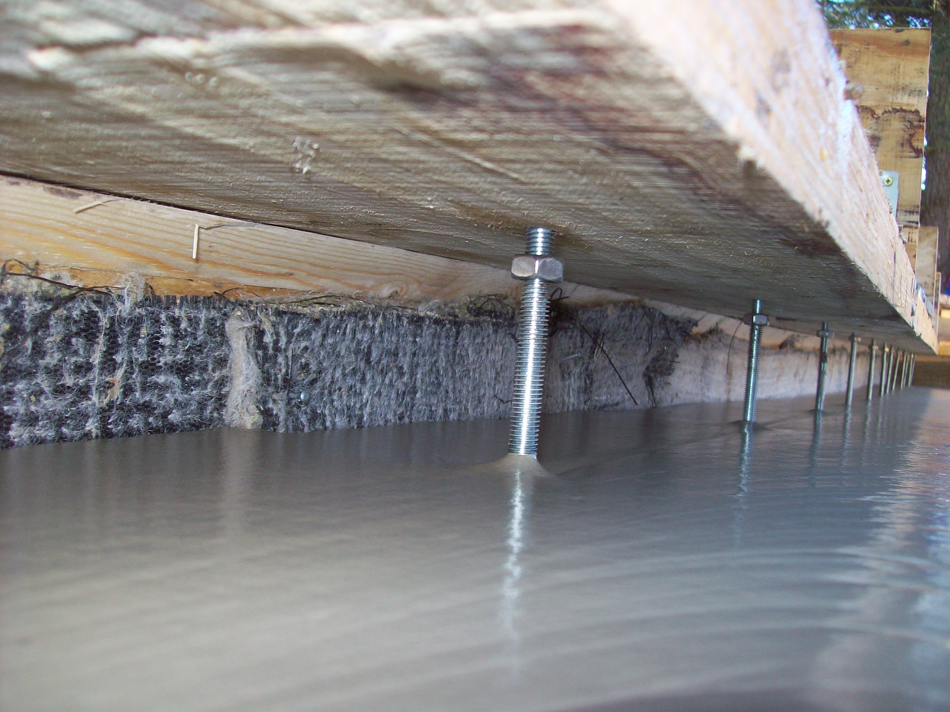 Foamed concrete used for thermally insulating sub floors at Dundee university environmentally sustainable housing project