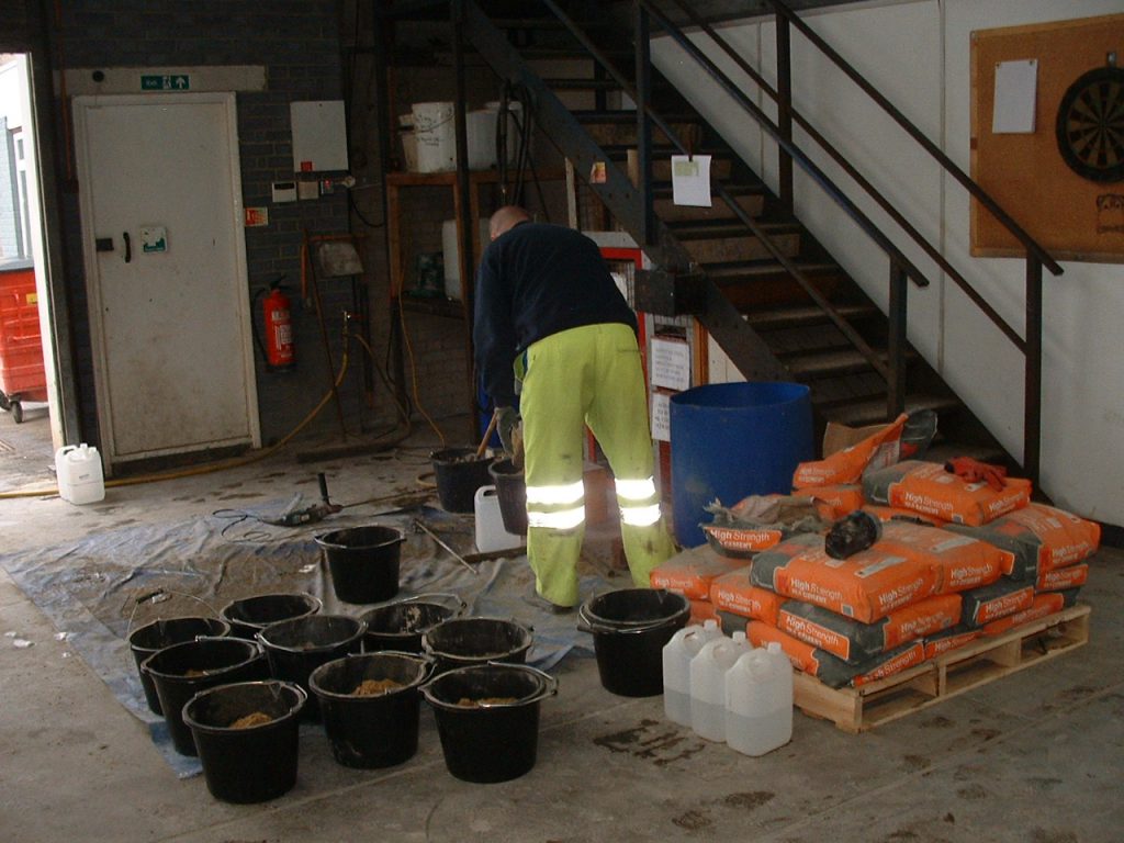 Foamed concrete mix design involving sample batching and pour trials