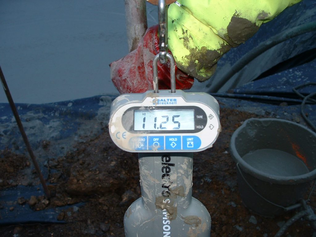 Foamed concrete density is calaculated on site using a set of scales and weighing a sample of 10 litres of material