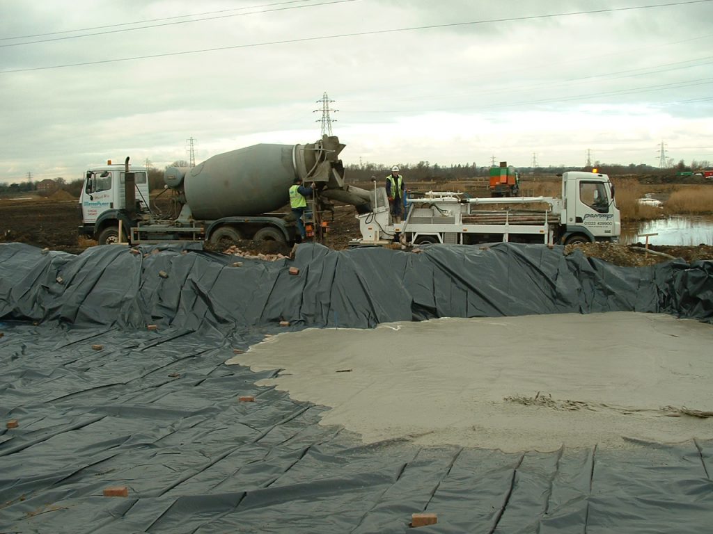Inline foamed concrete systems producing 400kg/m3 density material for road sub bases on reclaimed marshl and 