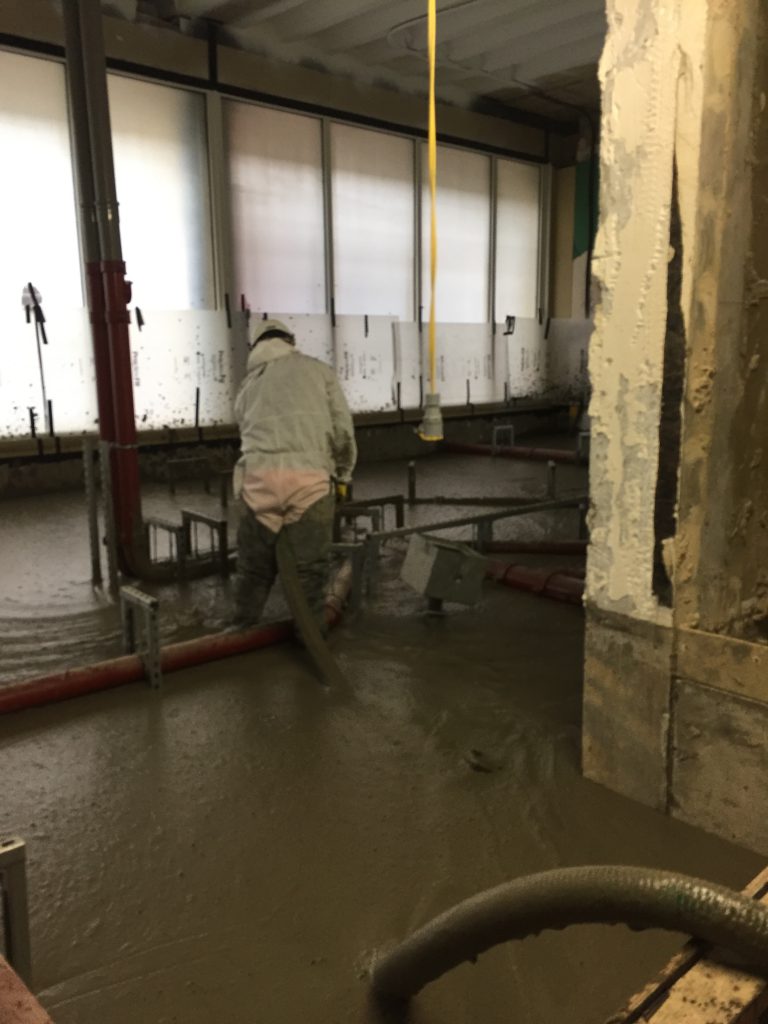 A 500kg/m3 foamed concrete placed in two pours of 500mm, the fluid material is thermally insulating for residential buildings and will also encapsulate drainage and utilities 